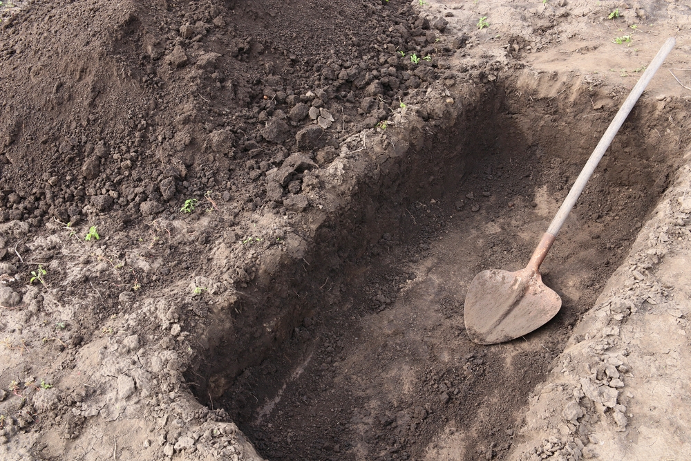 У деокупованому Ізюмі знайшли поховання кількасот закатованих людей